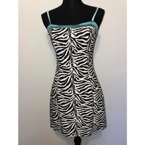 Cache Zebra print dress with blue trim and blue spaghetti straps.  Size small.